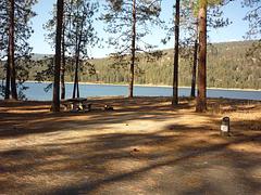 Kettle Falls CG with trees and water in the background.