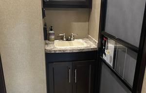 42’ Luxury Toyhauler with rare Side Patio