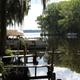 Waterfront dock and calm canal at Lake Rousseau RV Resort