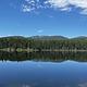 A photo of the view from Lakeside Campground, looking West over Lake Alva. 