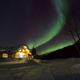 Aurora borealis behind the Log Cabin Wilderness Lodge