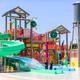 Colorful children’s water play structure and slides — highlights the on-site splash/play attraction for families, taken from the property’s official site.