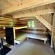 Wood cabin interior with bunks