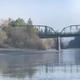 View of the Russian River with a nearby bridge — shows river access and nearby scenery. File is used on the campground’s reservations page, supporting relevance to the property.