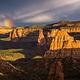 Rainbow and clouds above Monument Canyon