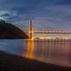 A view of the bay from Kirby Cove, with the Golden Gate Bridge lit.
