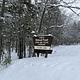 A snowy photo of Island lake (MI) sign 