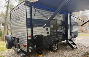 Travel light. Camp off‑grid. Fit for three.