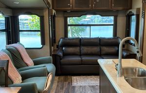 Spacious, stocked, delivered. King w/ pullout sofa