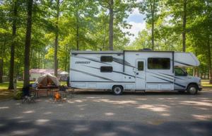 C06 - 10 Person w/ Bunk- The RV Rental Factory