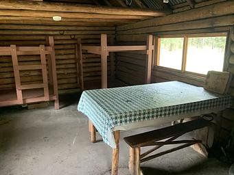 Inside Twogood Cabin dinning / sleeping area