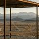 Hammocks overlooking the Christmas Mountains in Camp Elena's common area in Terlingua, Texas, near Big Bend National Park.