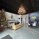 Interior clubhouse/lounge photo (antler chandelier, seating, branded sign) — shows indoor guest spaces and clubhouse character from the property's gallery.
