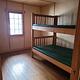 The cabin features 3 bedrooms, all with full sized bunkbeds.