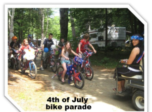 Photo of a live band on an outdoor stage set in a wooded campground area — represents entertainment/activities available on property; shown on the Activities page.
