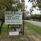 Clear photo of the Pace Bend RV Park roadside sign at the property entrance — confirms location and entry signage (used on the homepage).