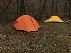 An orange and a yellow tent  pitched at Round Spring