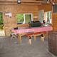 An interior view of a table and heater inside Esker Stream Cabin (Wrangell-St Elias)