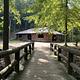 A photo of facility CAVE MOUNTAIN LAKE GROUP PICNIC SHELTER with Shade