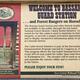 Sign with information about Bassam cabin