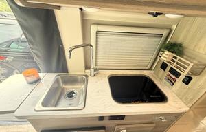 Self‑Contained Travato 59G — Sleeps 2, Seats 4