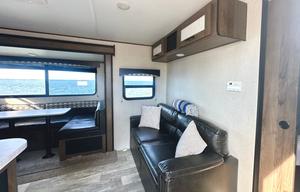 Fully furnished travel trailer for a small family.