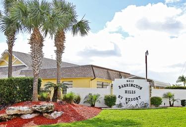 Entry/landscape shot showing the 'Barrington Hills RV Resort' sign and grounds — establishes property identity and entrance appearance from the site’s image set.