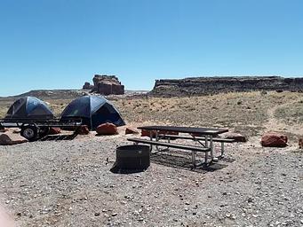 Courthouse Rock Campground campsites with rock formation in the background