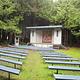 The outdoor amphitheater at Kalaloch. Benches provide ample seating around the small, covered stage.