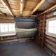 Log cabin with fold up bunk beds