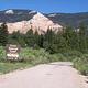 Entrance to PINE LAKE CAMPGROUND with view of adjacent pink cliffs.
