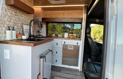 The Elite Explorer: Custom Luxury 4x4 Sprinter Van