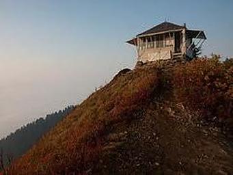 lookout cabin Evergreen in fall