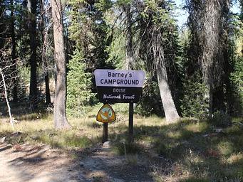 Barney's campground sign partially shaded