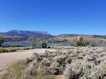 Cow Creek south sage field with reservoir and mountains in background
