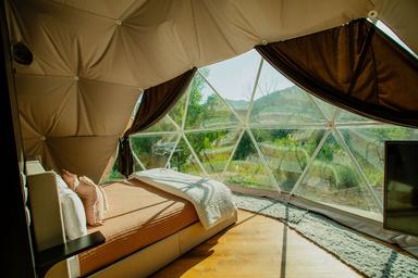 Inside the River Dome â geodesic dome interior with panoramic canyon views and cozy bed