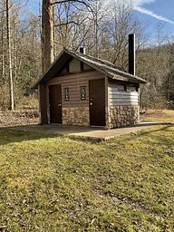 Kuykendall Group site includes a pit toilet with two restrooms