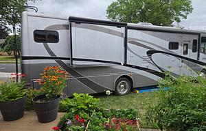 One beautiful Coach 36Z Infinity 2005