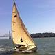 Bear Boat "The Merry Bear" one of the small crafts in the park's historic collection, sailing on San Francisco Bay
