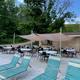 Outdoor dining / poolside seating area (Munchies Café) — shows guest seating and pool-adjacent amenities from the amenities page.