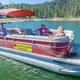 Marina dock and boats at sunset showing on-site waterfront facilities and docks — highlights the marina amenities adjacent to the RV park (present on the site’s gallery).