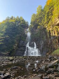 Large waterfall in a rocky gorge — iconic High Falls feature (IMG_0598) shown on the site’s main/gallery imagery, representing the park’s natural attraction on the property.