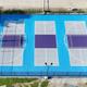 Aerial/overhead photo of the on-site multi-court (basketball/tennis) facility — useful facility overview and appears to be taken on the resort grounds.
