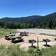Site B with picnic table, campfire ring, and parking.