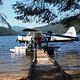 Four people getting on floatplane on Virginia Lake