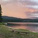 View from Seeley Lake swim beach at dusk. A storm rolls in from the East. 