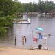 View of the guarded swim area with dock, lifeguard station and lake shoreline — useful detail of the beach facilities (from the site’s Photo Gallery page).