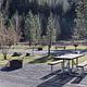 Each RV site has a fire ring, standing BBQ grill, and picnic table.