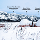 Geodesic dome in front of stream and Teton Mountains with pins pointing out JHMR, Grand Teton National Park, and Yellow Stone National Park.