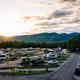 Aerial/resort overview at sunset showing layout of RV pads, roads and surrounding landscape — useful overview of West Glacier RV Park (matches gallery on property page).